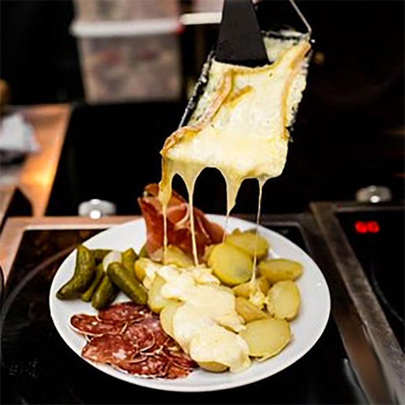 How to Host a Melty Cheese-Centric Raclette Party with Charcuterie